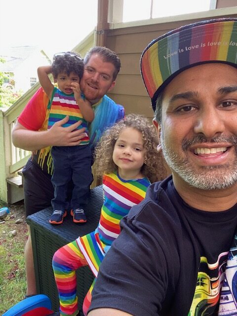 family in pride clothes