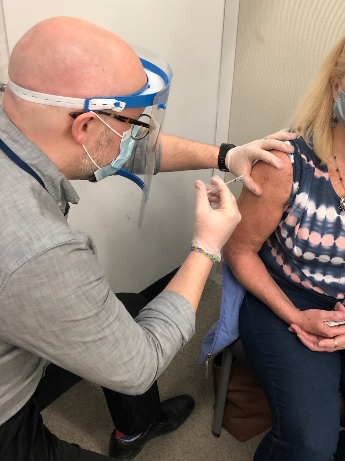 Jeremy administering a vaccine