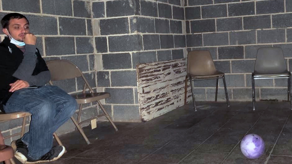 Patrick Korellis in haunted basement