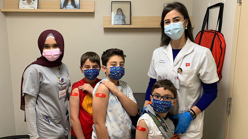 Walgreens pharmacist, her family and intern