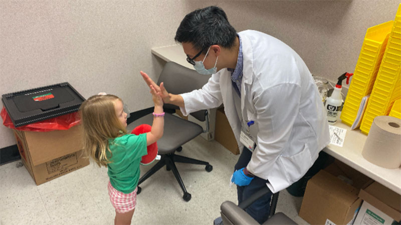 Mattie gets high-five from Walgreens pharmacist