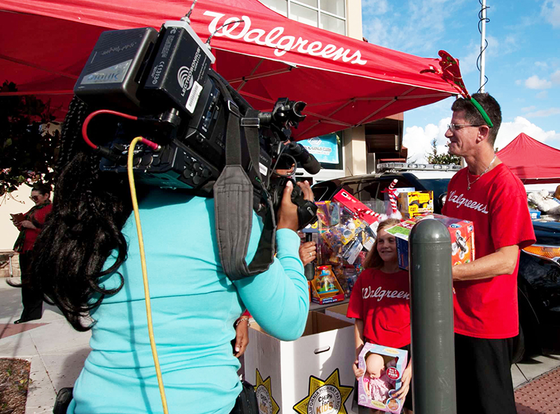 Jerry Pira and his daughter Caity doing a local TV interview