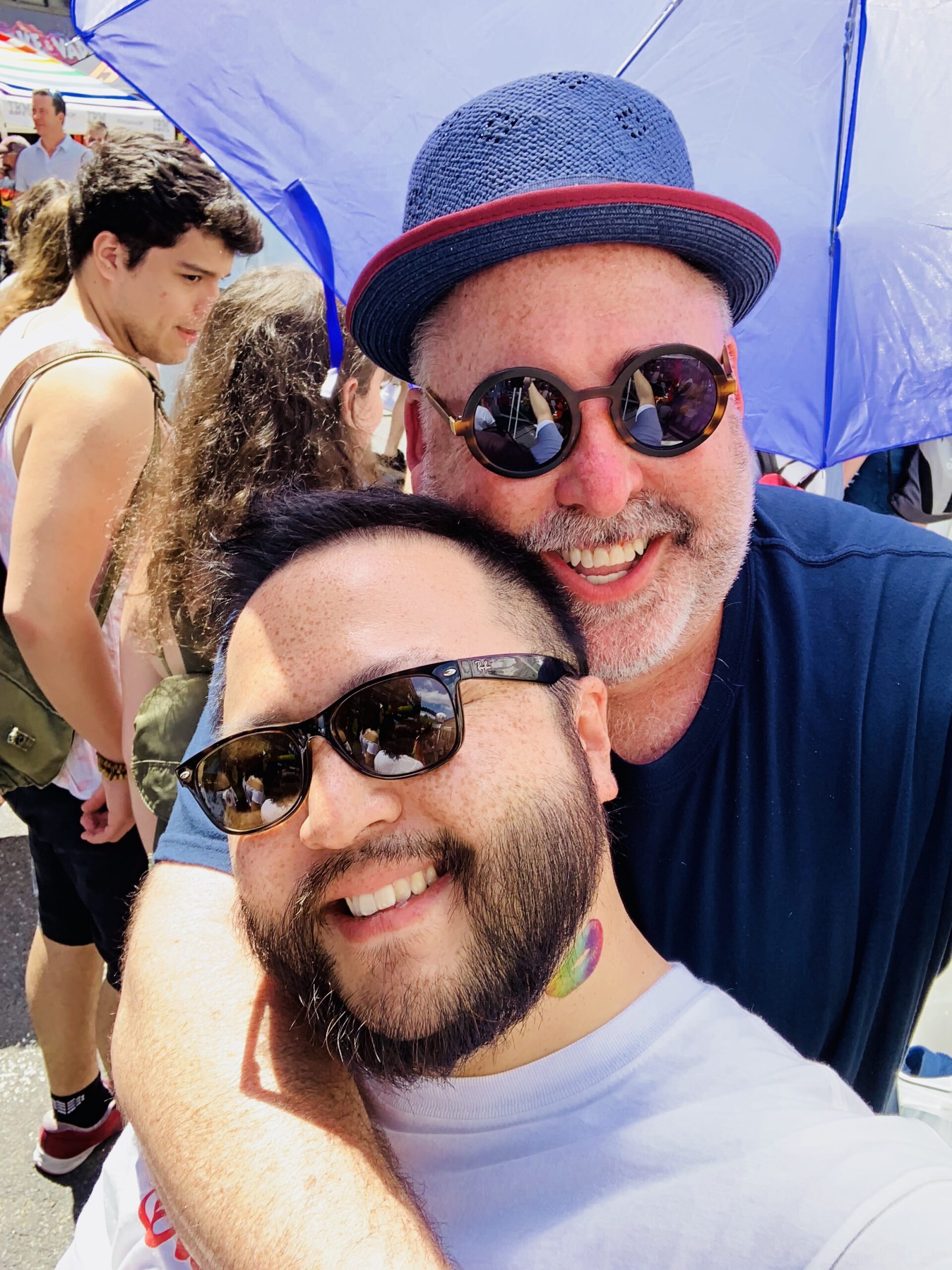 HIV specialty pharmacist Aaron Kim with his husband, Chris.