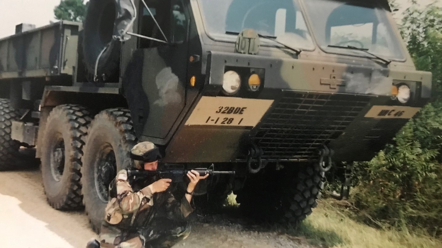 jake in front of tank